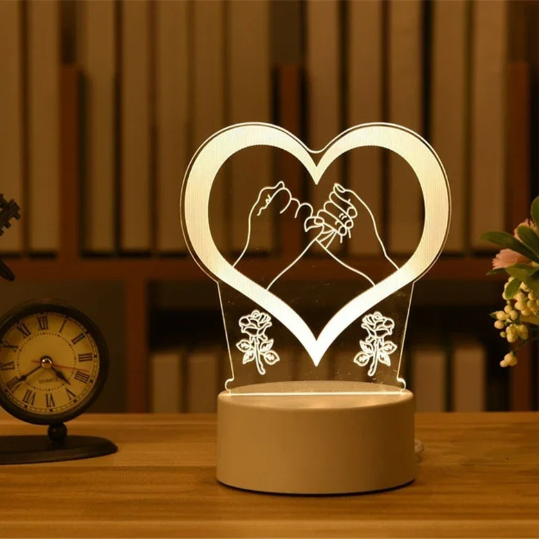 Luminária 3D com mãos entrelaçadas dentro de coração – símbolo de compromisso e afeto